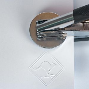 wytłoczona sucha pieczęć w papierze wraz ze stęplem